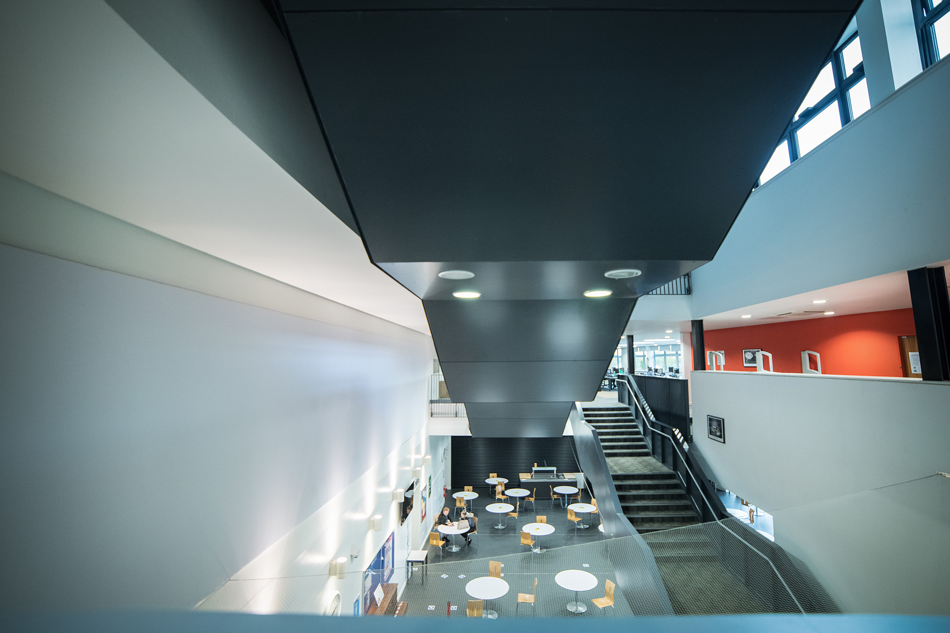 Communal space with tables and chairs at Midlothian campus